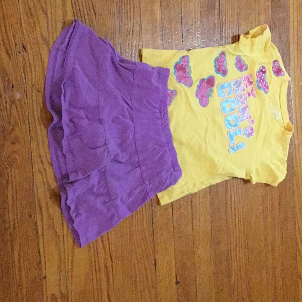 Yellow T-shirt and purple skirt
